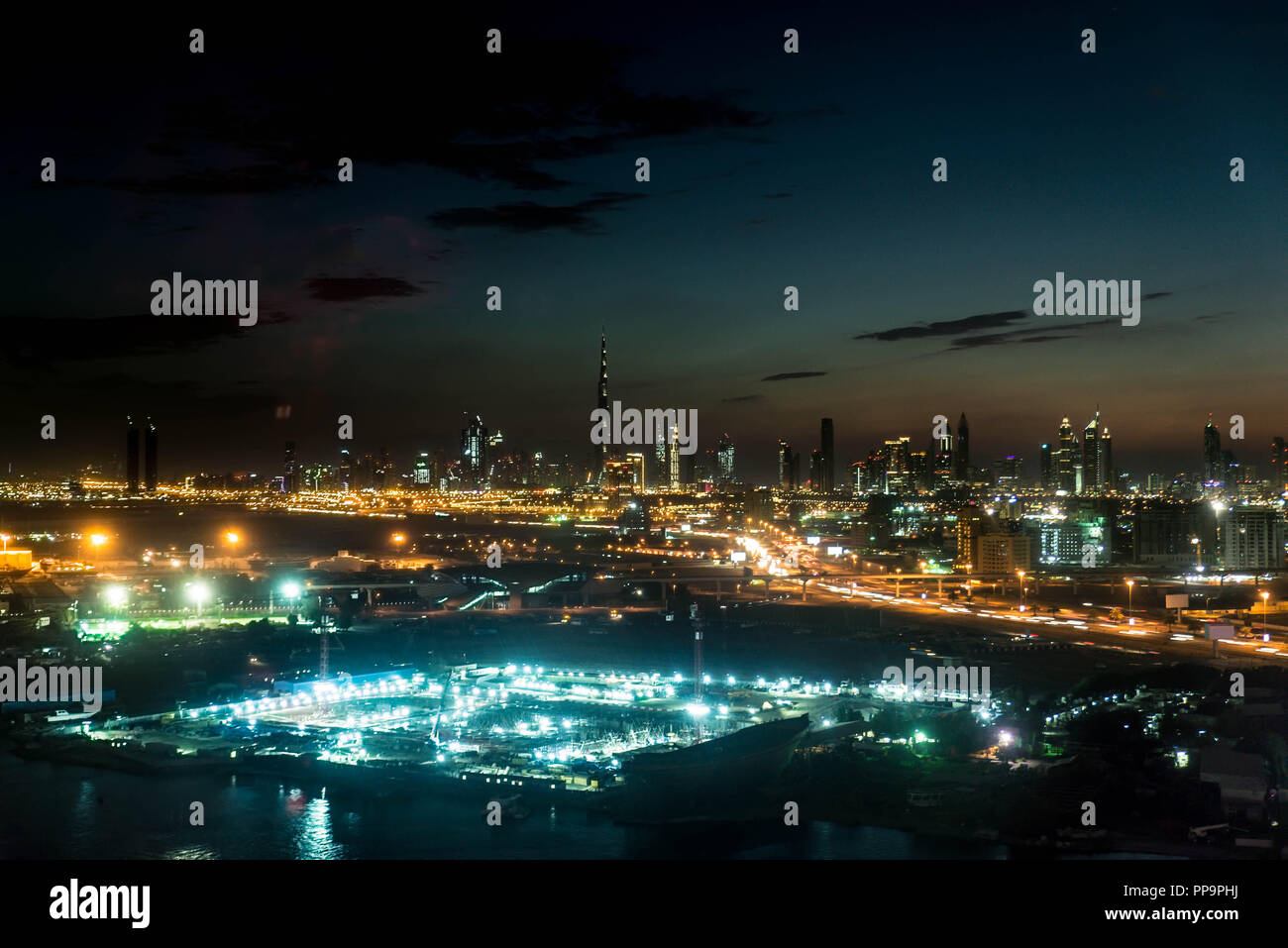 Dubai skyline at sunset Stock Photo - Alamy