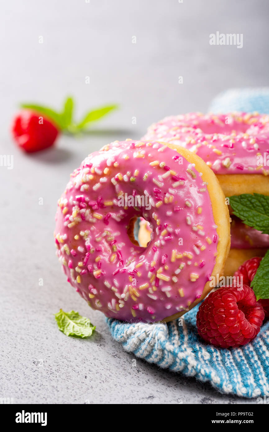 Pink donuts on gray background Stock Photo