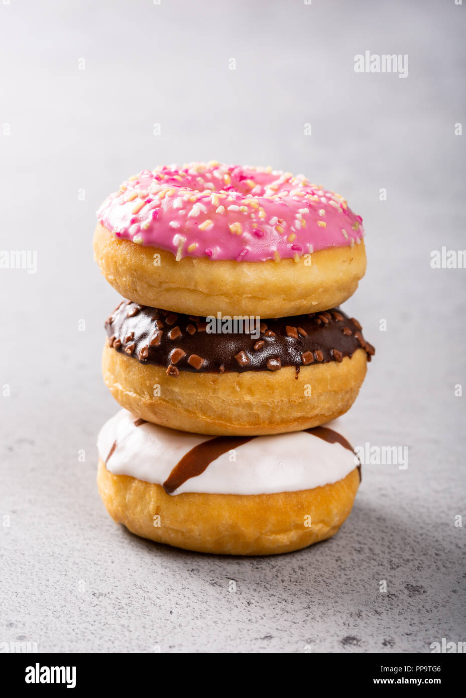Stack of colorful donuts Stock Photo
