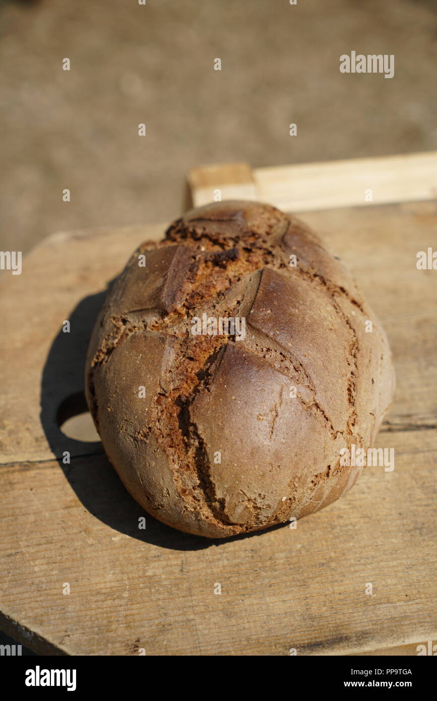 Freshly baked bread baked in a wood oven according to an old recipe