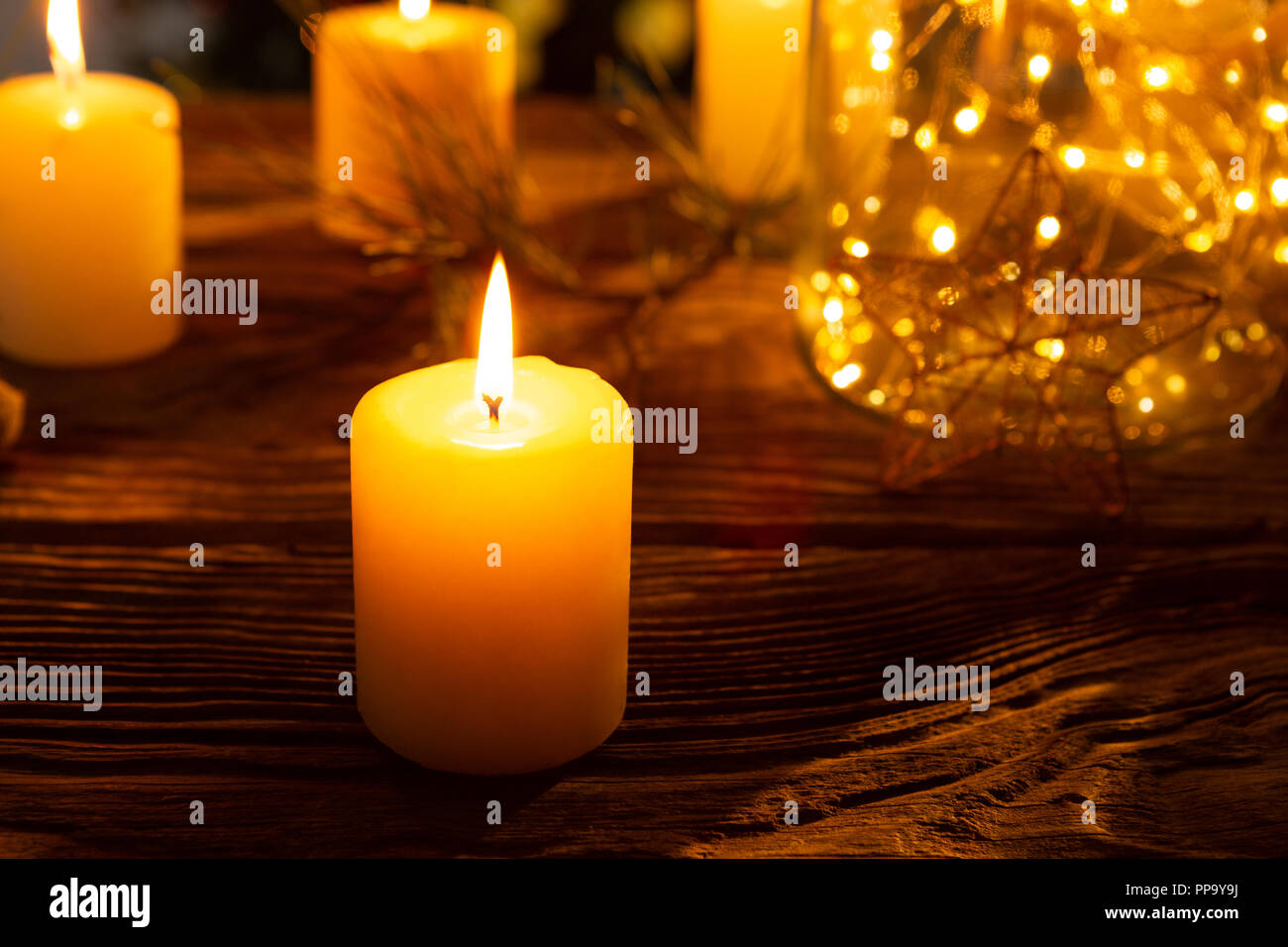 warm candles and ornament Stock Photo