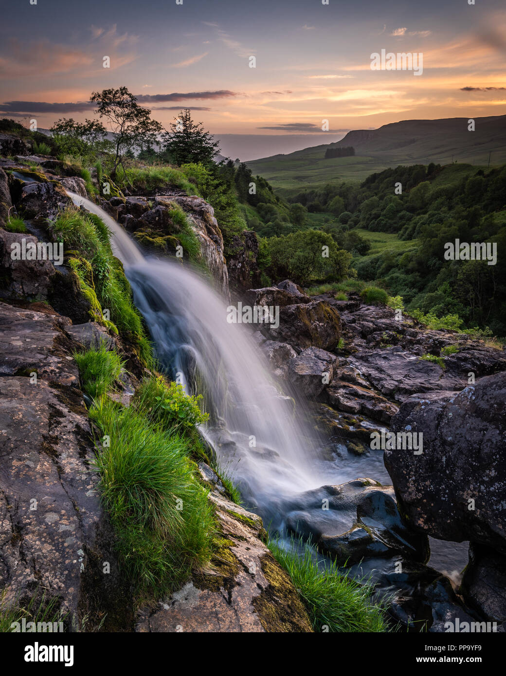Sunset at the Loup of Fintry waterfall north of Glasgow Scotland Stock Photo