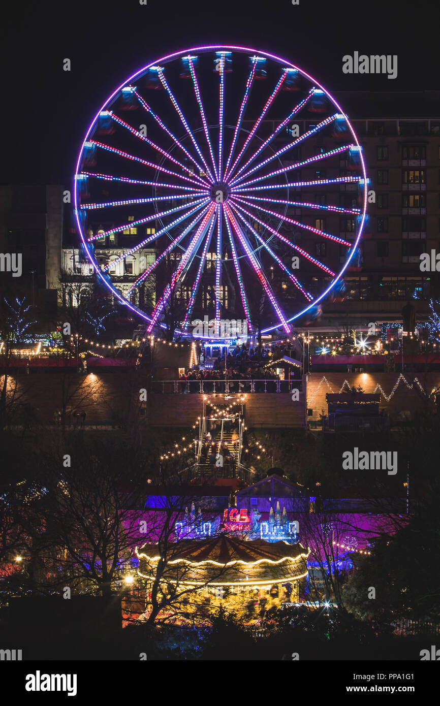 Ferris Wheel at Christmas Market in Edinburgh at night, Scotland UK