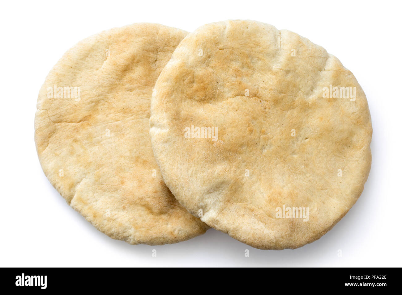 Two plain pita breads isolated on white from above. Stock Photo