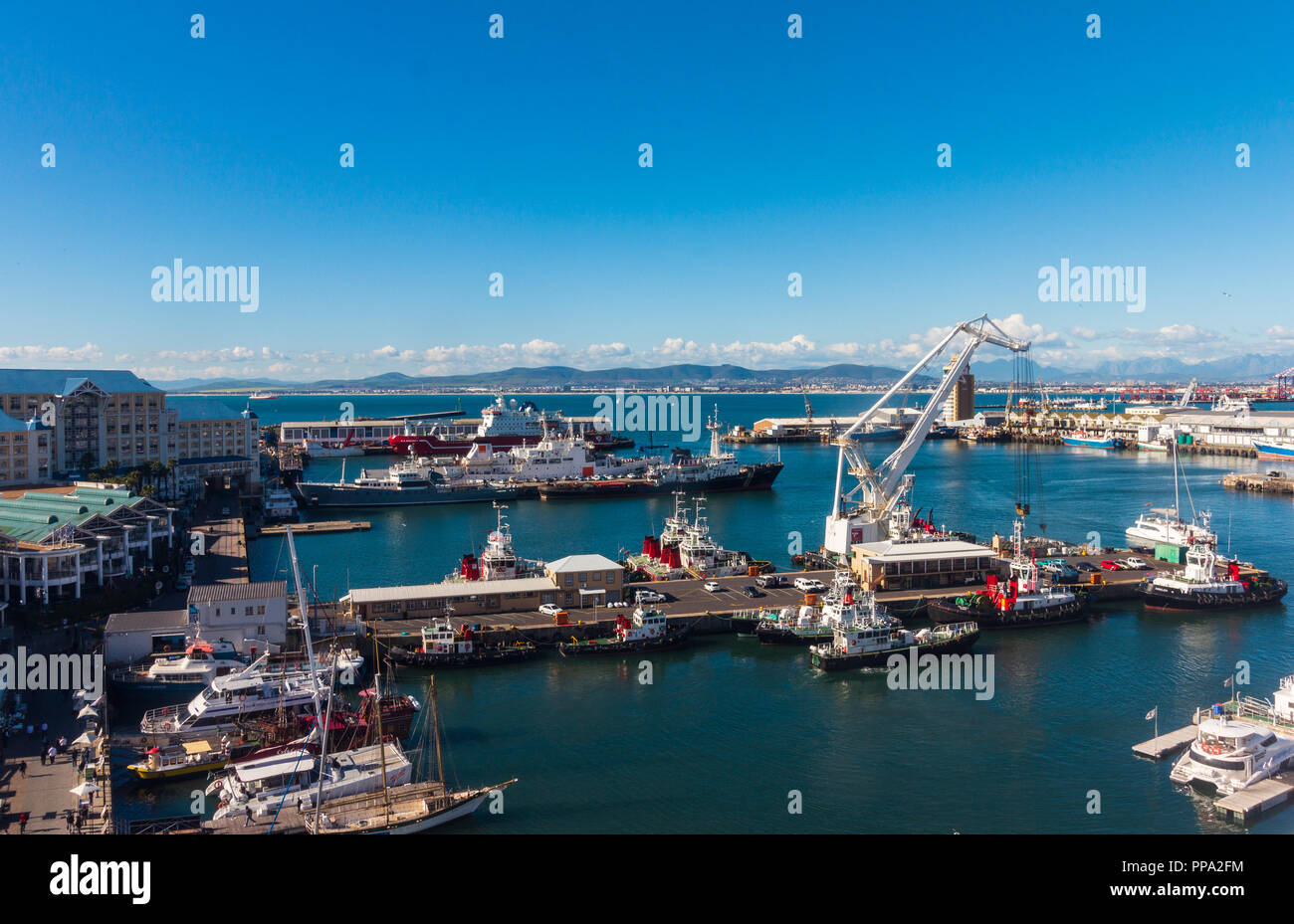 Aerial view of Cape Town waterfront, various types of nautical vessels docked in the harbor. Stock Photo