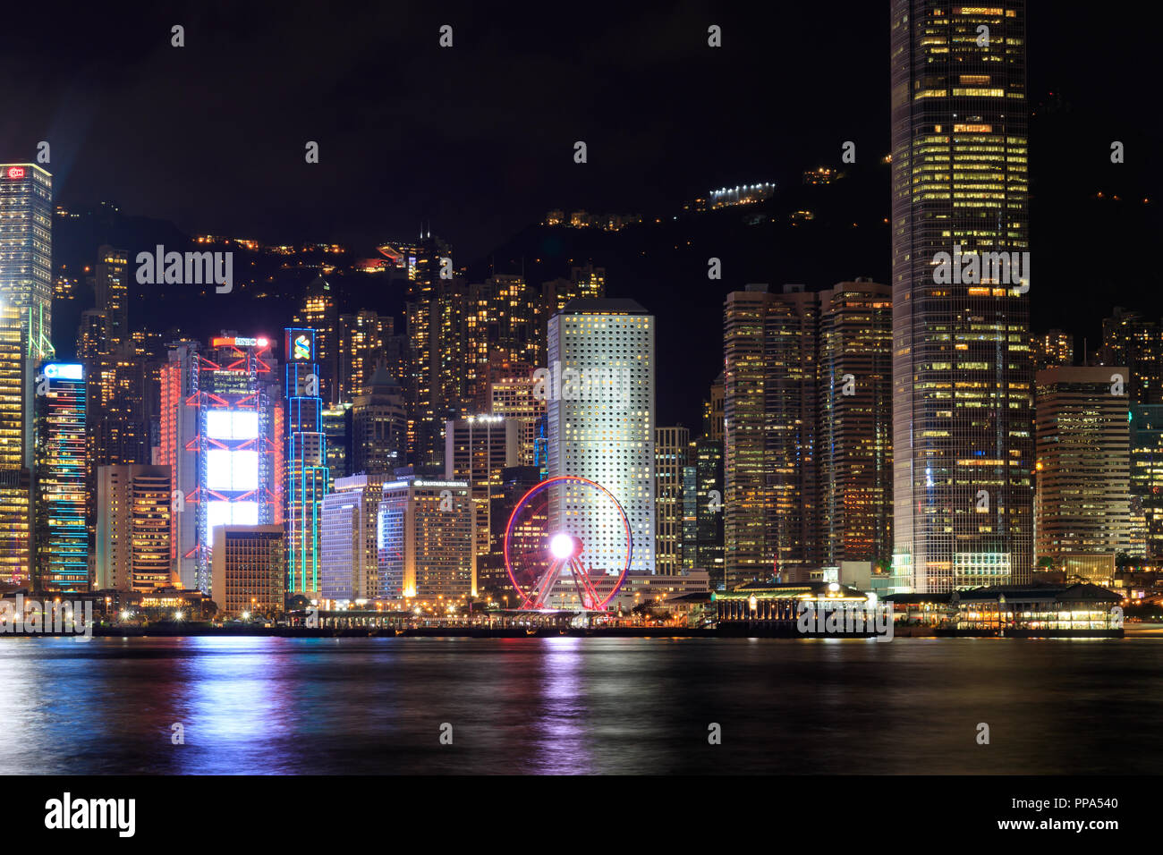 Hong Kong - June 28, 2018: Skyline Of Hong Kong Island And The Hong Kong Observation Wheel Stock Photo