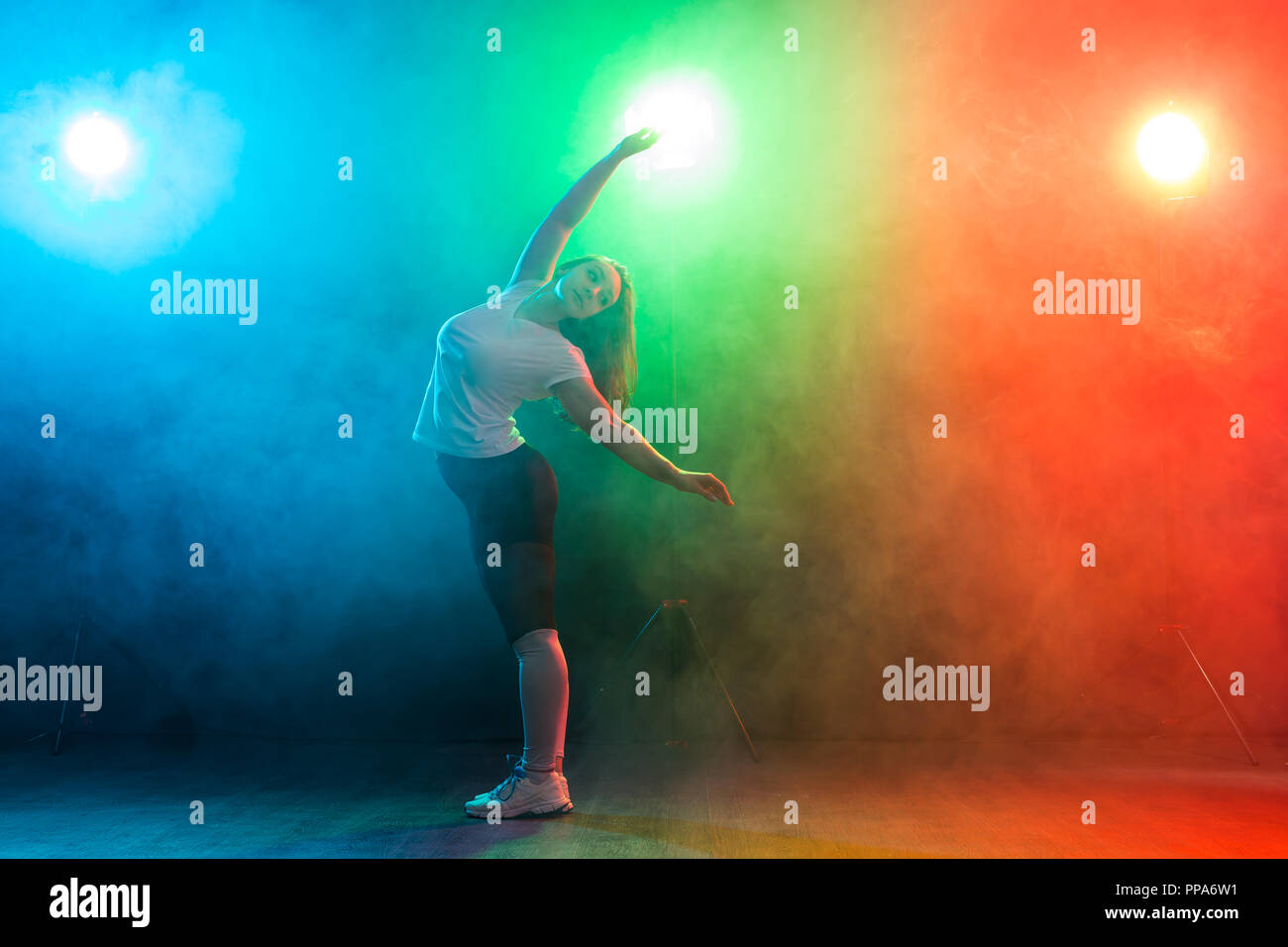 People and dancing concept- European young woman dancing jazz funk over ...