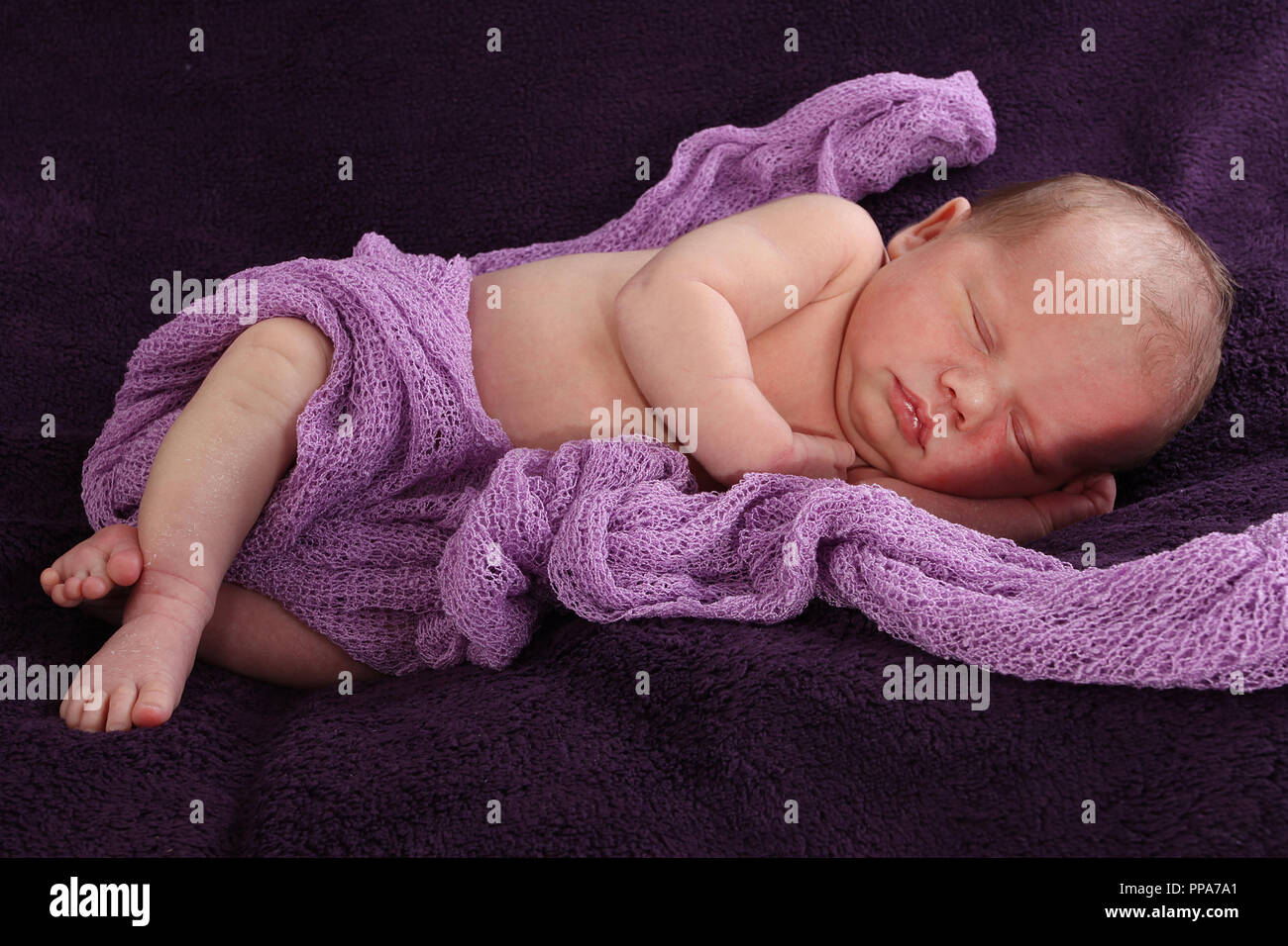 5 day old new born baby girl sleeping Stock Photo Alamy