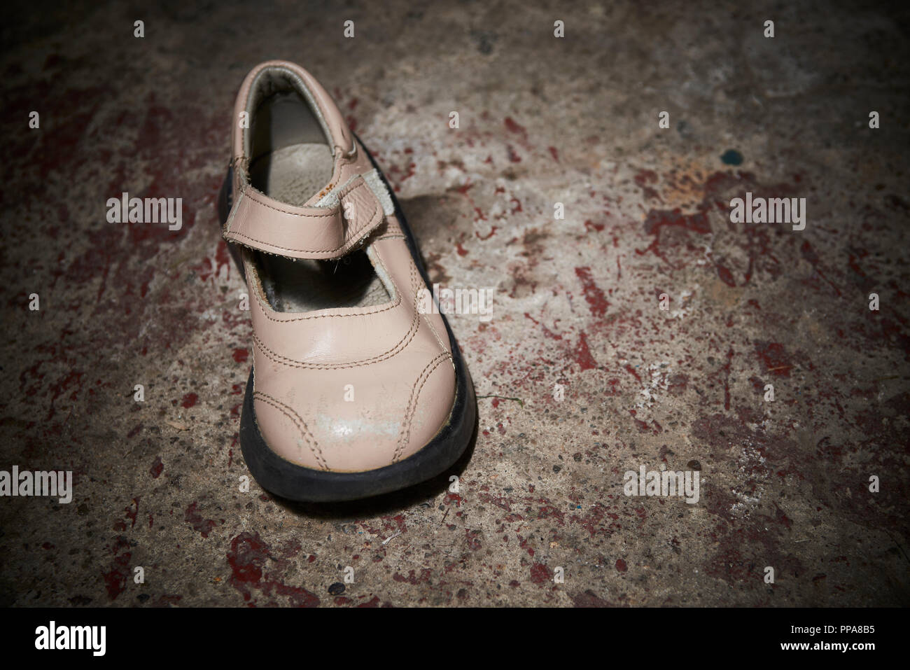 Abandoned Baby Shoe Lying On Old Concrete Floor Lost Children S Shoes Stock Photo Alamy
