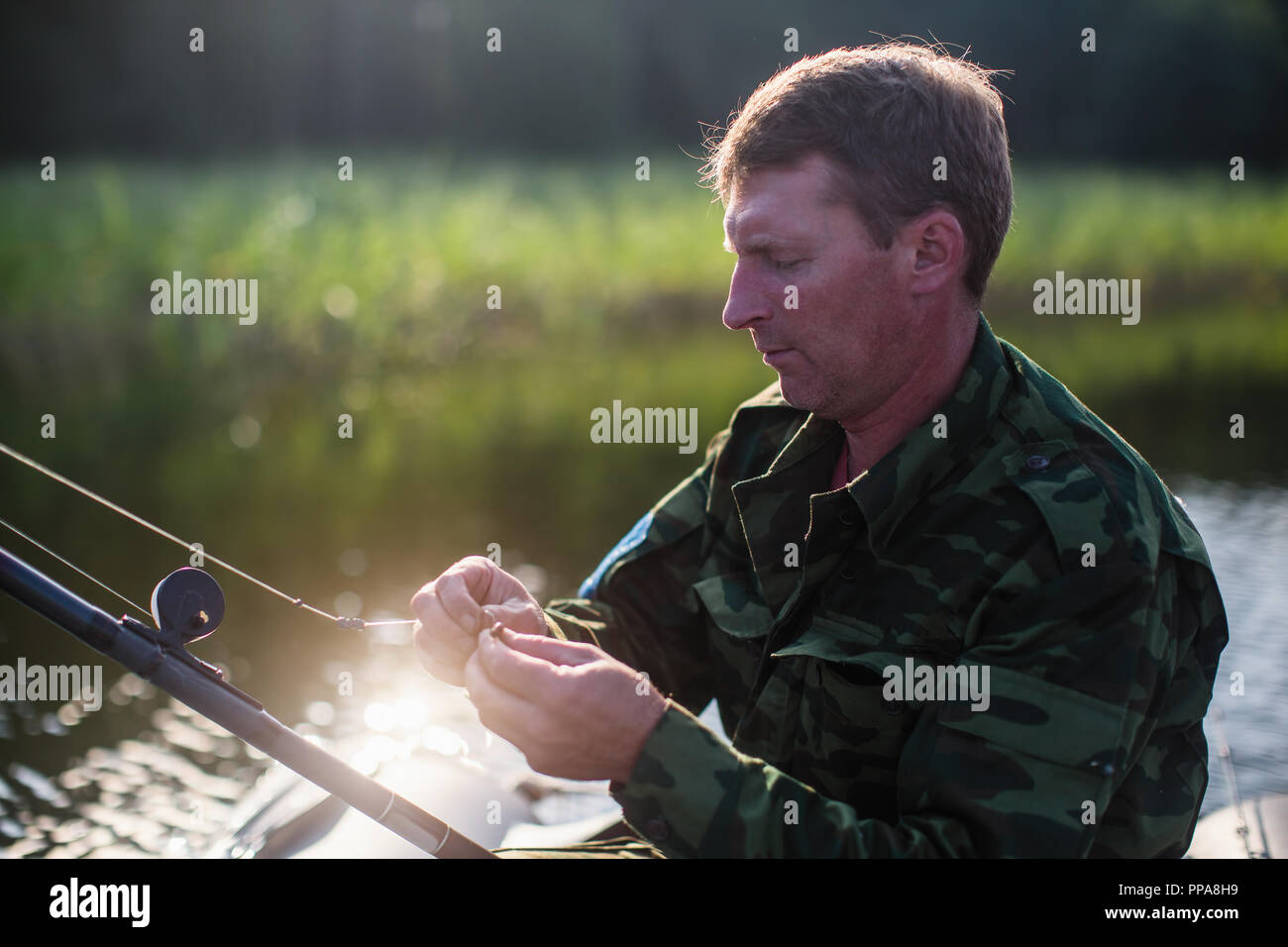 Camouflage hunter river hires stock photography and images Alamy