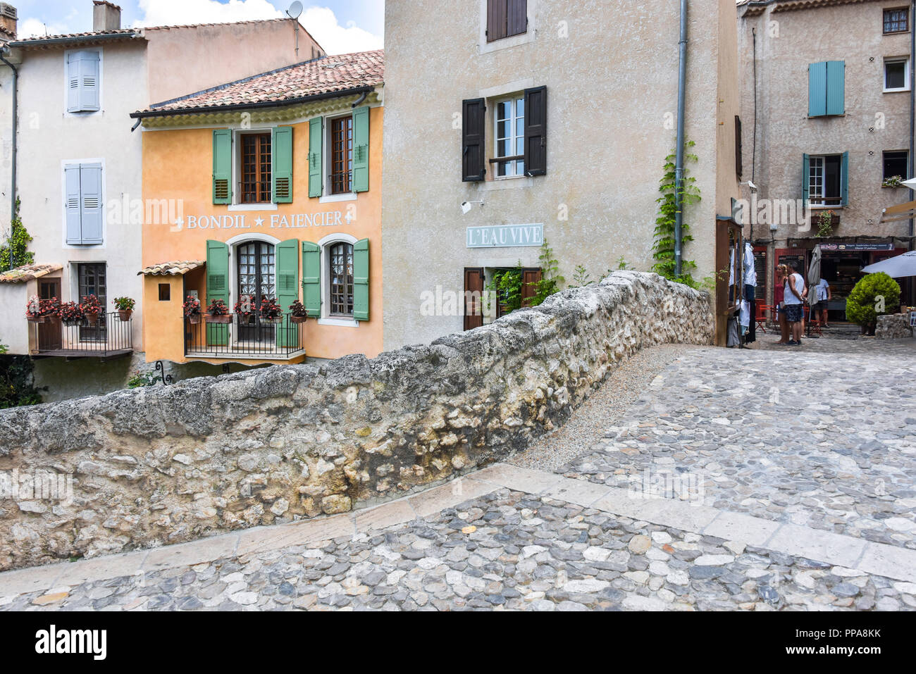 village Moustiers-Sainte-Marie, Provence, France, houses at stone bridge, member of most beautiful villages of France Stock Photo