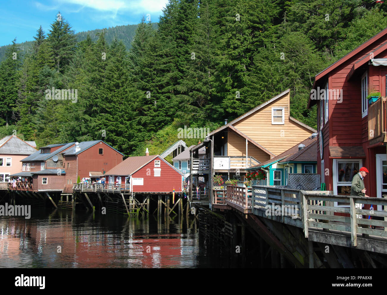Shops and restaurants in wooden buildings built over water in Ketchikan