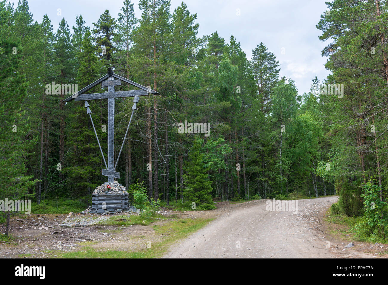 Large wooden cross beside the road on Solovki, Arkhangelsk oblast, Russia. Stock Photo