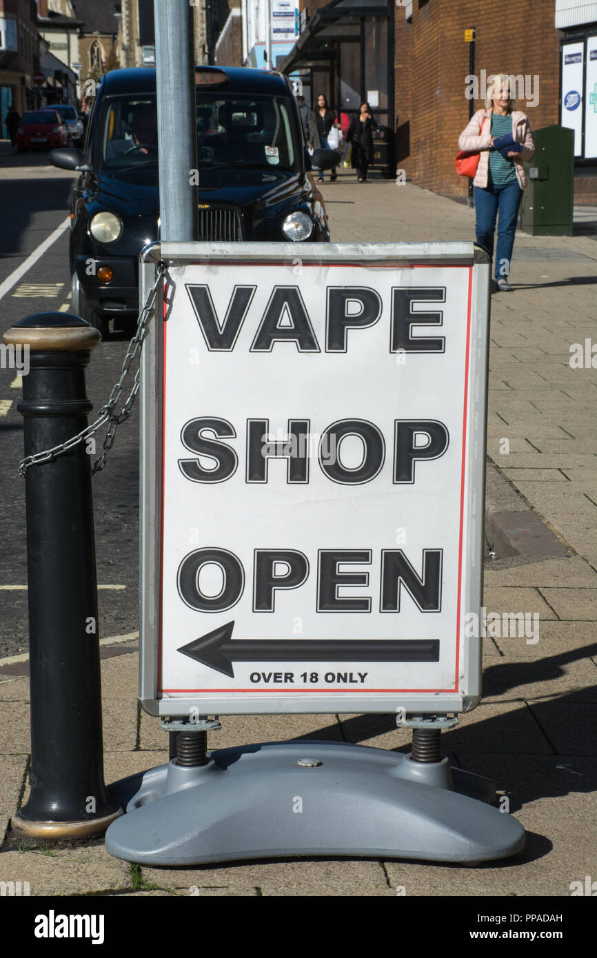 Vape shop open sign on street in Hampshire, UK Stock Photo