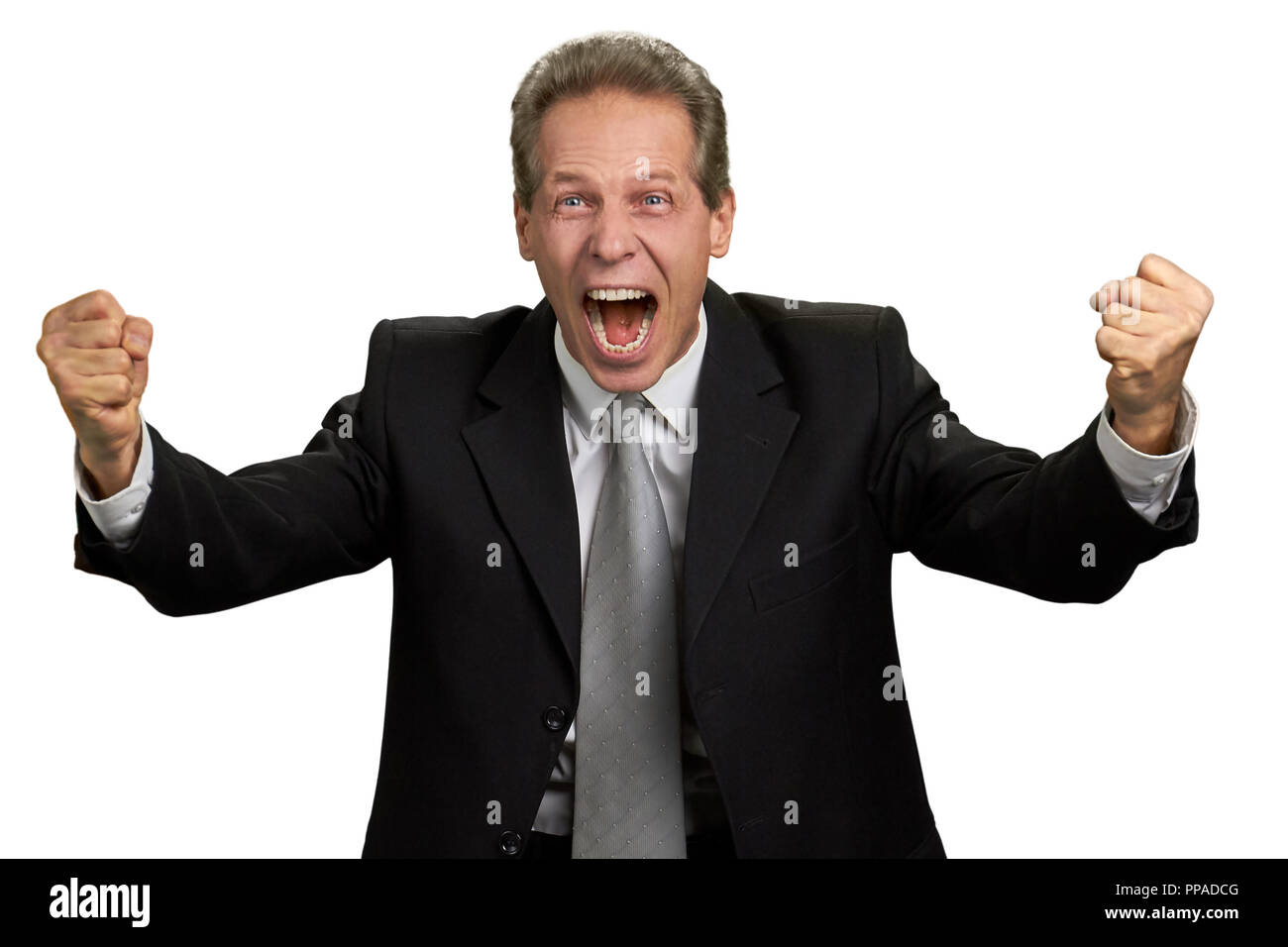 Happy excited man triumphing with raised fists Stock Photo - Alamy