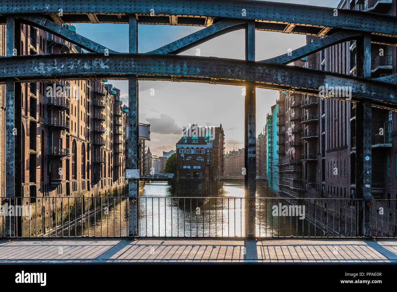 famous historic warehouse district Speicherstadt in Hamburg, Germany in evening sunlight Stock Photo