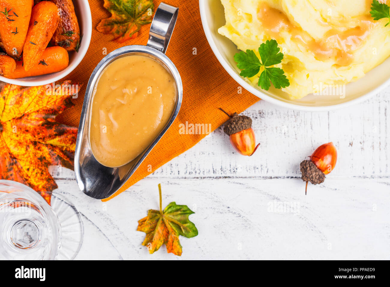 Sauce boat with savory turkey gravy Stock Photo Alamy