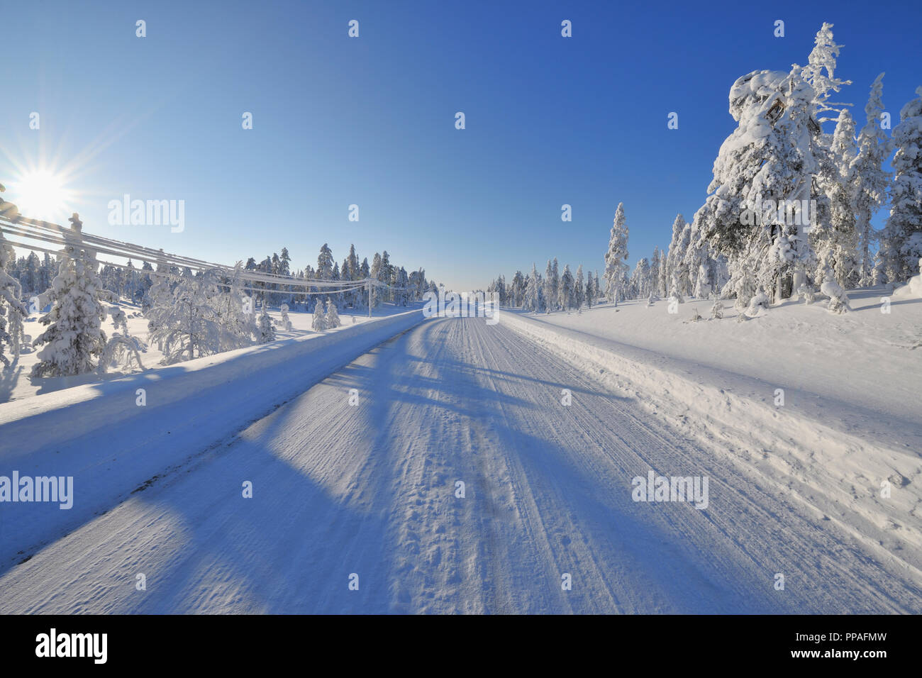 Snow covered road in winter, Posio, Kuusamo, Nordoesterbotten, Pohjois  Pohjanmaa, Finland, Suomi Stock Photo - Alamy