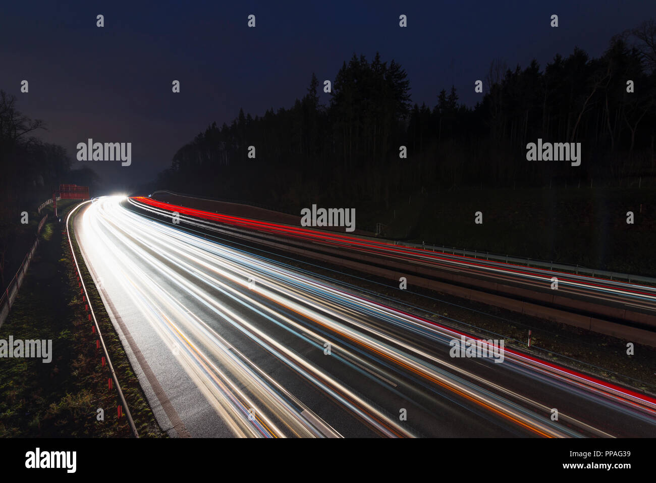Highway with Traffic Lights, at Night, Light Trail, Germany Stock Photo