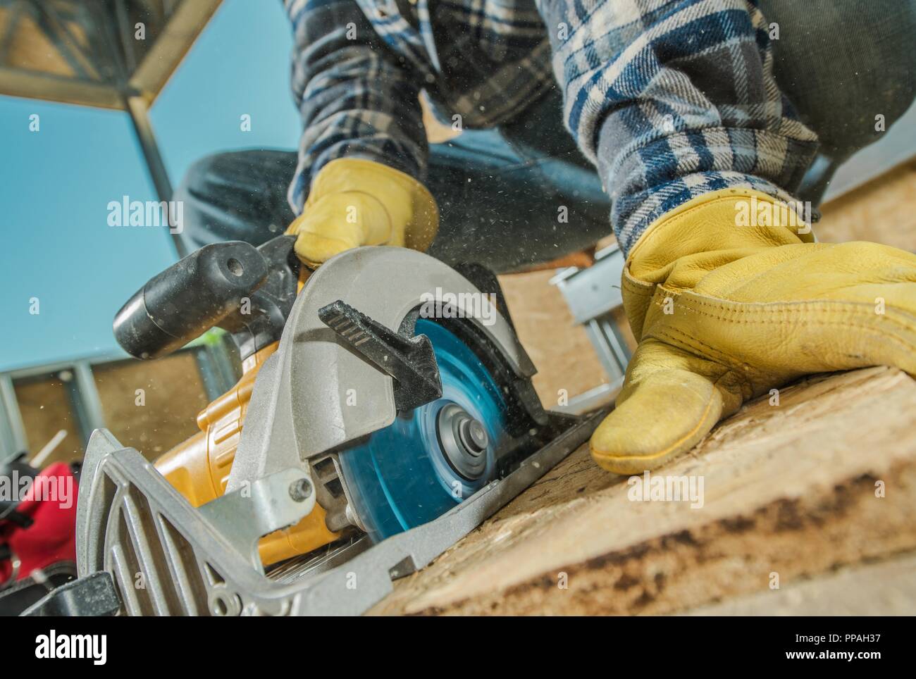 Plywood Cut by Circular Saw. Construction Worker and the Woodworking Stock Photo Alamy