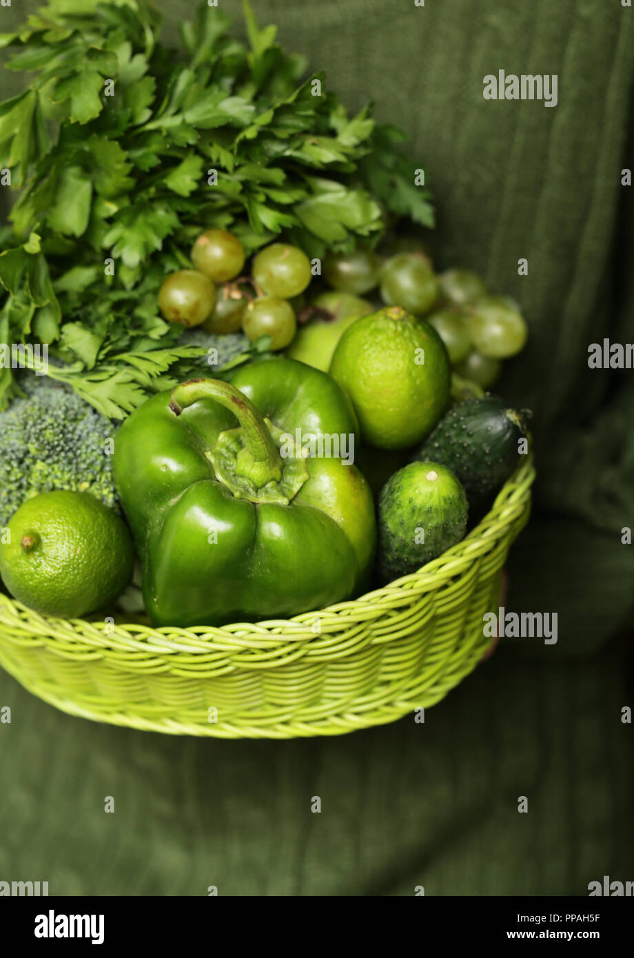 green vegetables and fruits in a wicker basket Stock Photo - Alamy