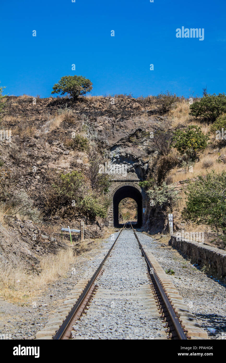view of the train tracks with a tunnel leading to the Tequila Jalisco