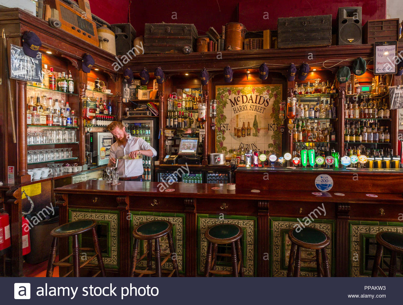 Bartender Liquor Bar Stools High Resolution Stock Photography and