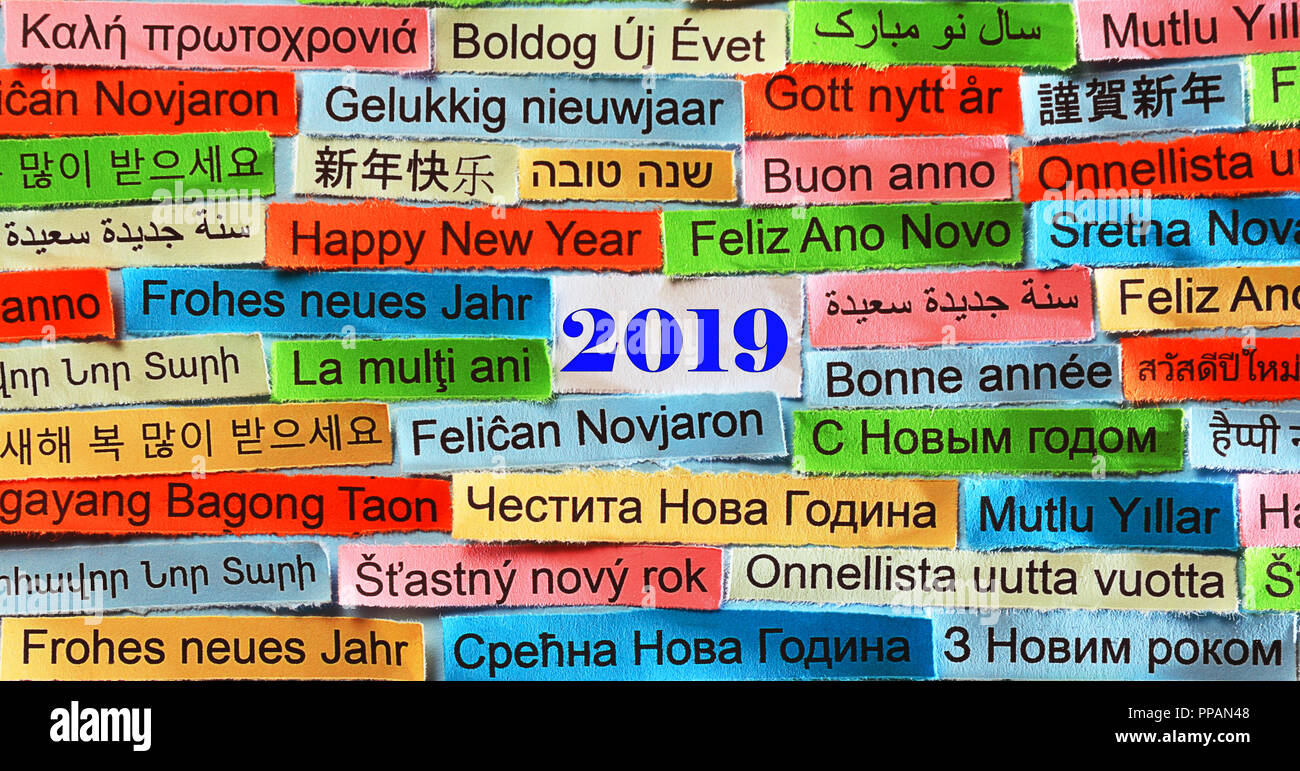 Happy New Year 2019 Word Cloud printed on colorful paper different languages Stock Photo