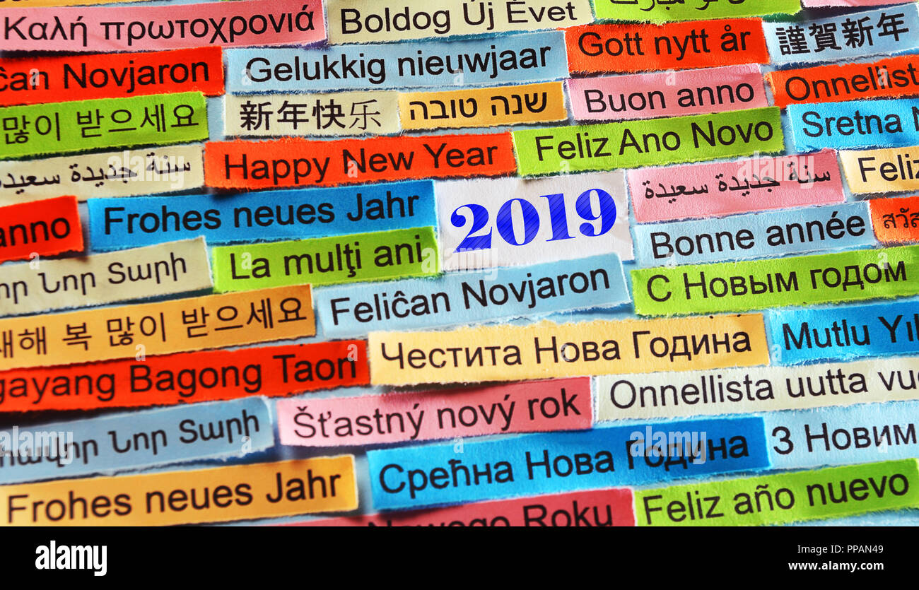 Happy New Year 2019 Word Cloud printed on colorful paper different languages Stock Photo