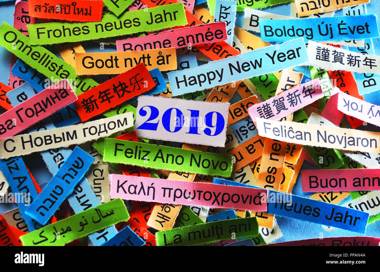 Happy New Year 2019 Word Cloud printed on colorful paper different languages Stock Photo