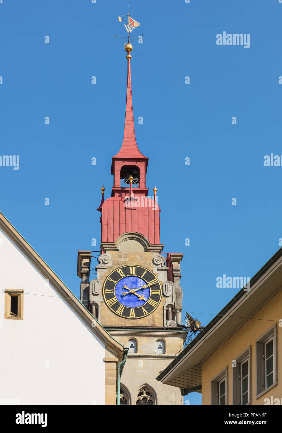 One of two towers of the City Church of Winterthur (German: Stadtkirche Winterthur) in Switzerland against blue sky. Stock Photo