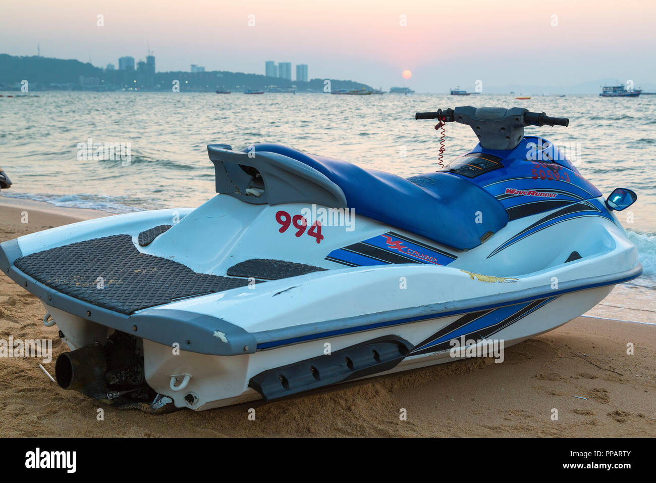 Jet ski on the beach at sunset, Pattaya, Chonburi, Thailand Stock Photo