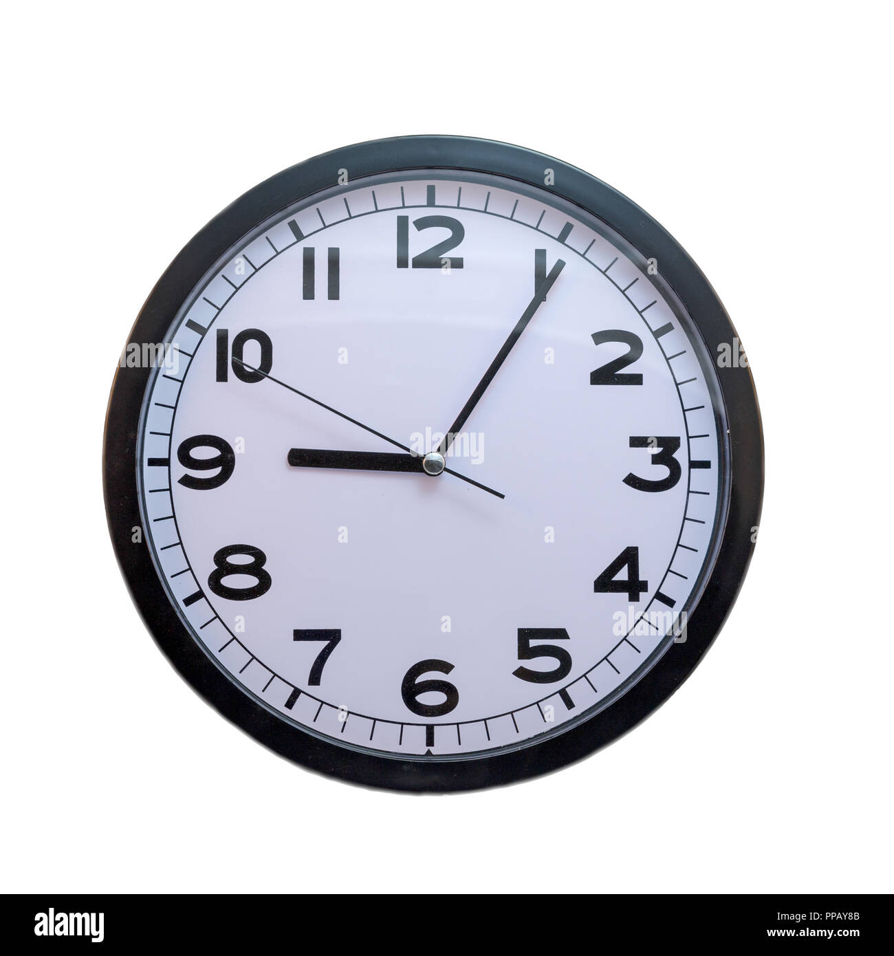 isolated clock showing five past nine o'clock Stock Photo