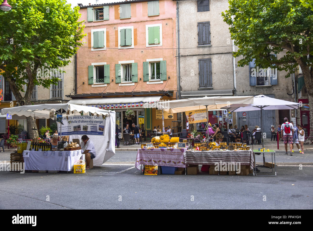 street market with regional products at the annual festival of lavender honey in Riez, Provence, France, department Alpes-de-Haute-Provence Stock Photo