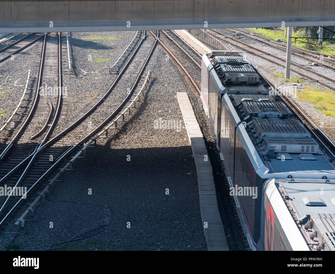 The railway track, light rail vehicle train pass through a railway
