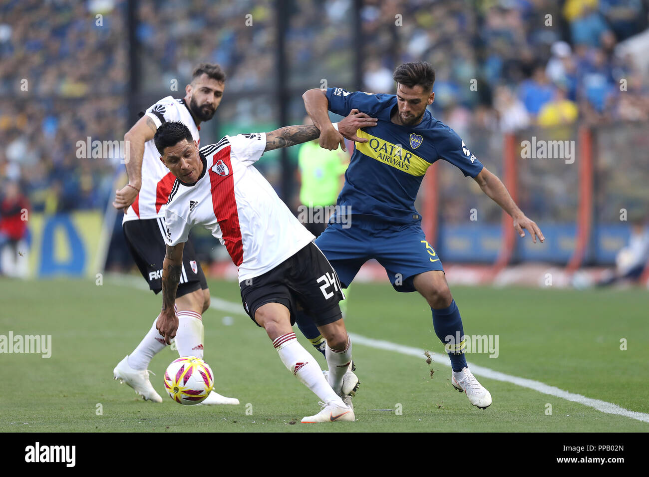 BUENOS AIRES, ARGENTINA - SEPTEMBER 23, 2008: Enzo Perez (River) fighting the ball with Emanuel Mas (Boca) in the Alberto J. Armanado in Buenos Aires, Stock Photo