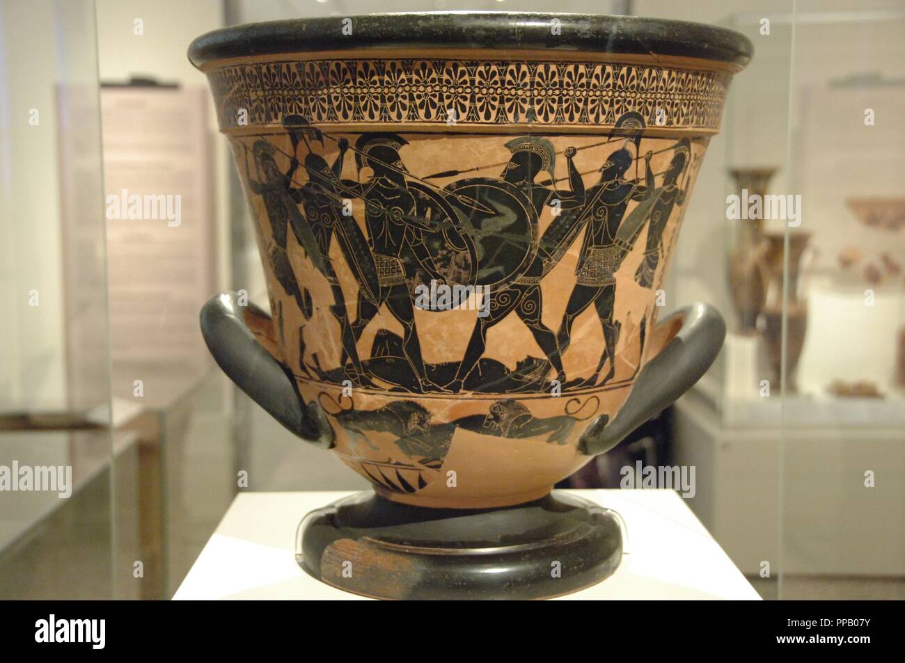 Greek art. Attic krater painted with black figures representing an Homeric battle around the body of a dead warrior (possibly Patroclus). Found at Pharsala. Dated circa 530 BCE.  National Archaeological Museum. Athens. Greece. Stock Photo