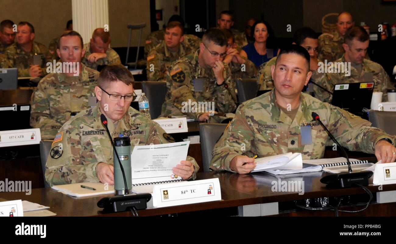 Attendees listen to opening remarks during the First Army Training