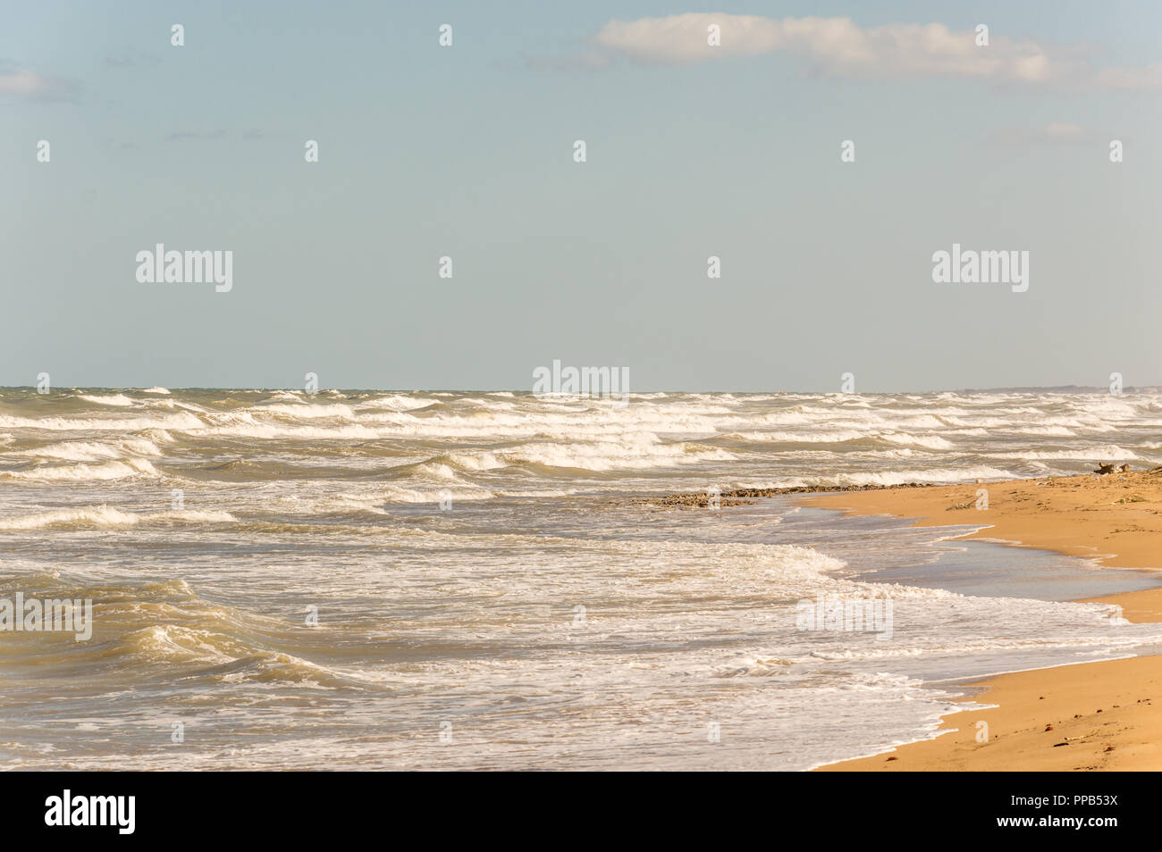 Waves on the sandy beaches of Ostuni in Salento on the Adriatic sea Stock Photo