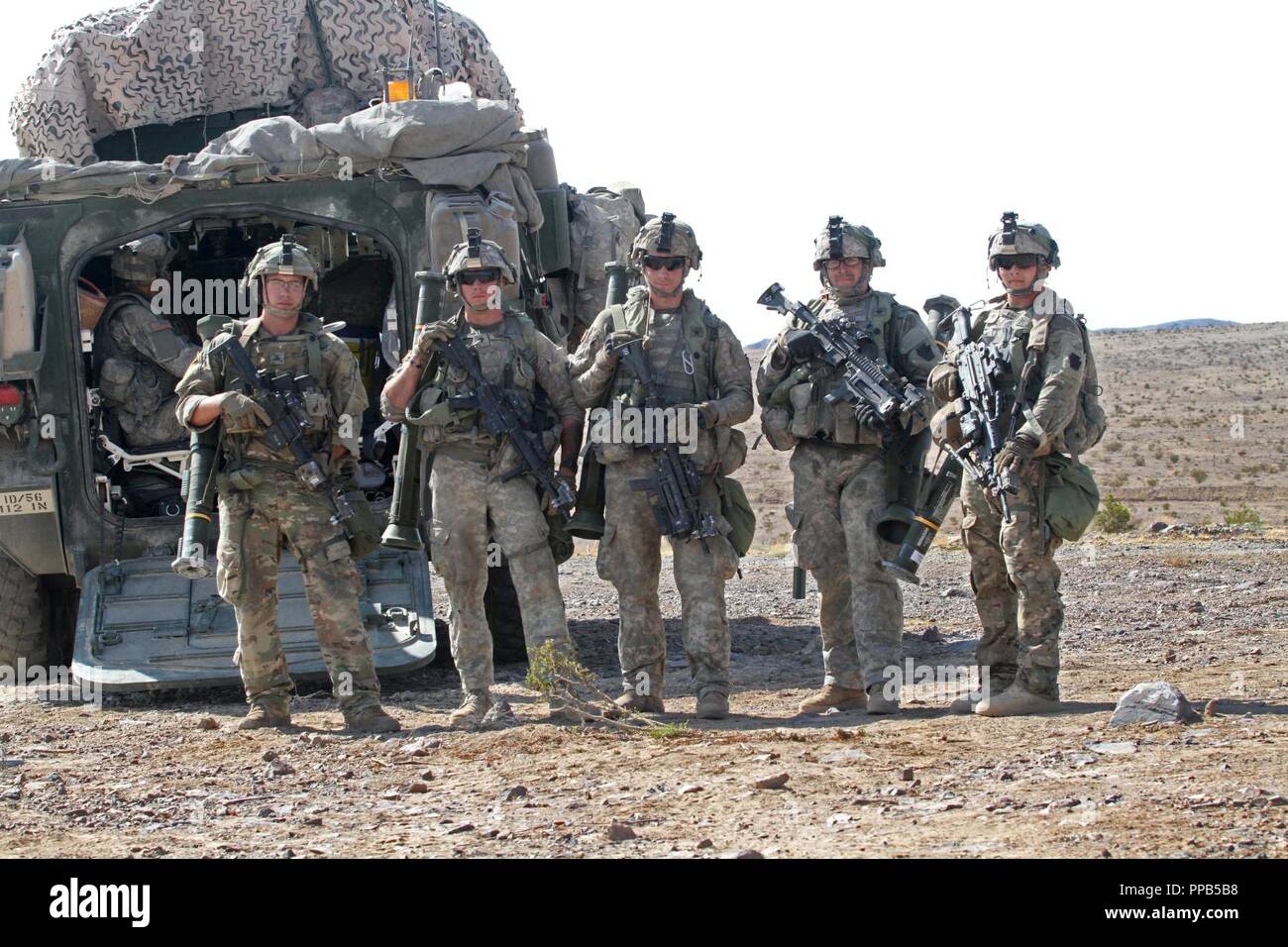 From left to right, Spc. Joshua Decker, Spc. Dylan Leonard, Sgt. Kevin  Litz, Spc. Sam Garman, and Spc. William Reed, all infantrymen with Alpha  Company, 2nd Battalion, 112th Infantry Regiment, 56th Stryker