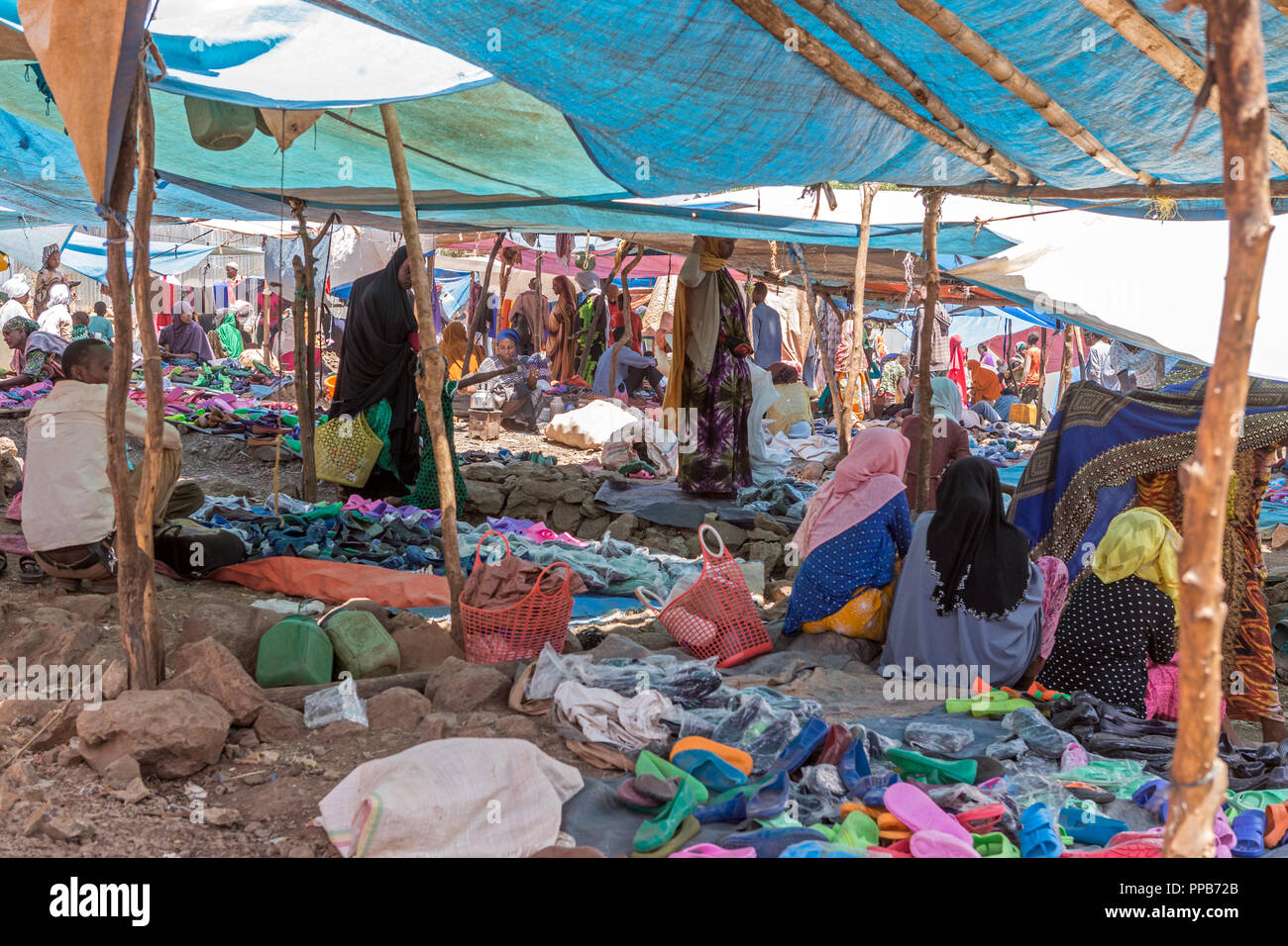 Dolo Mena market, Oromia Region, Ethiopia. Clothes and shoes. Stock Photo