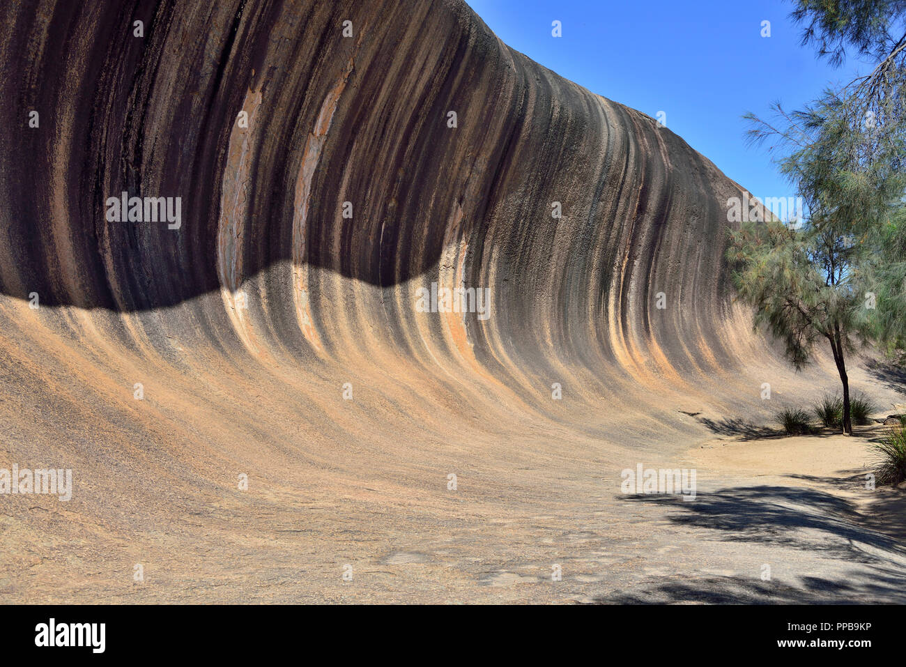 Shadows on Wave Rock  a unique granite rock shaped like a wave at Hyden, South Western Australia Stock Photo