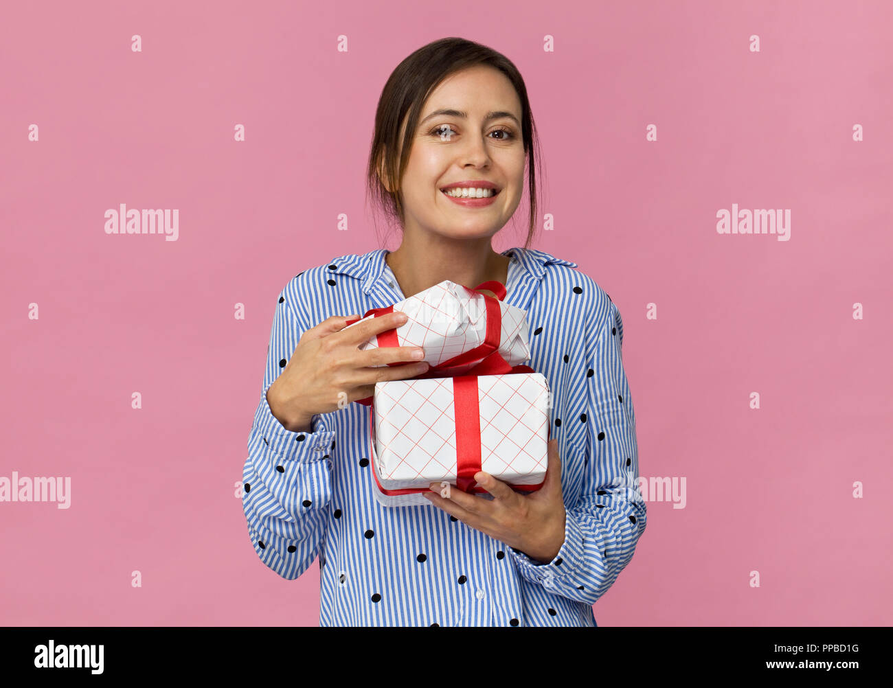 Woman in a blue shirt hi-res stock photography and images - Alamy