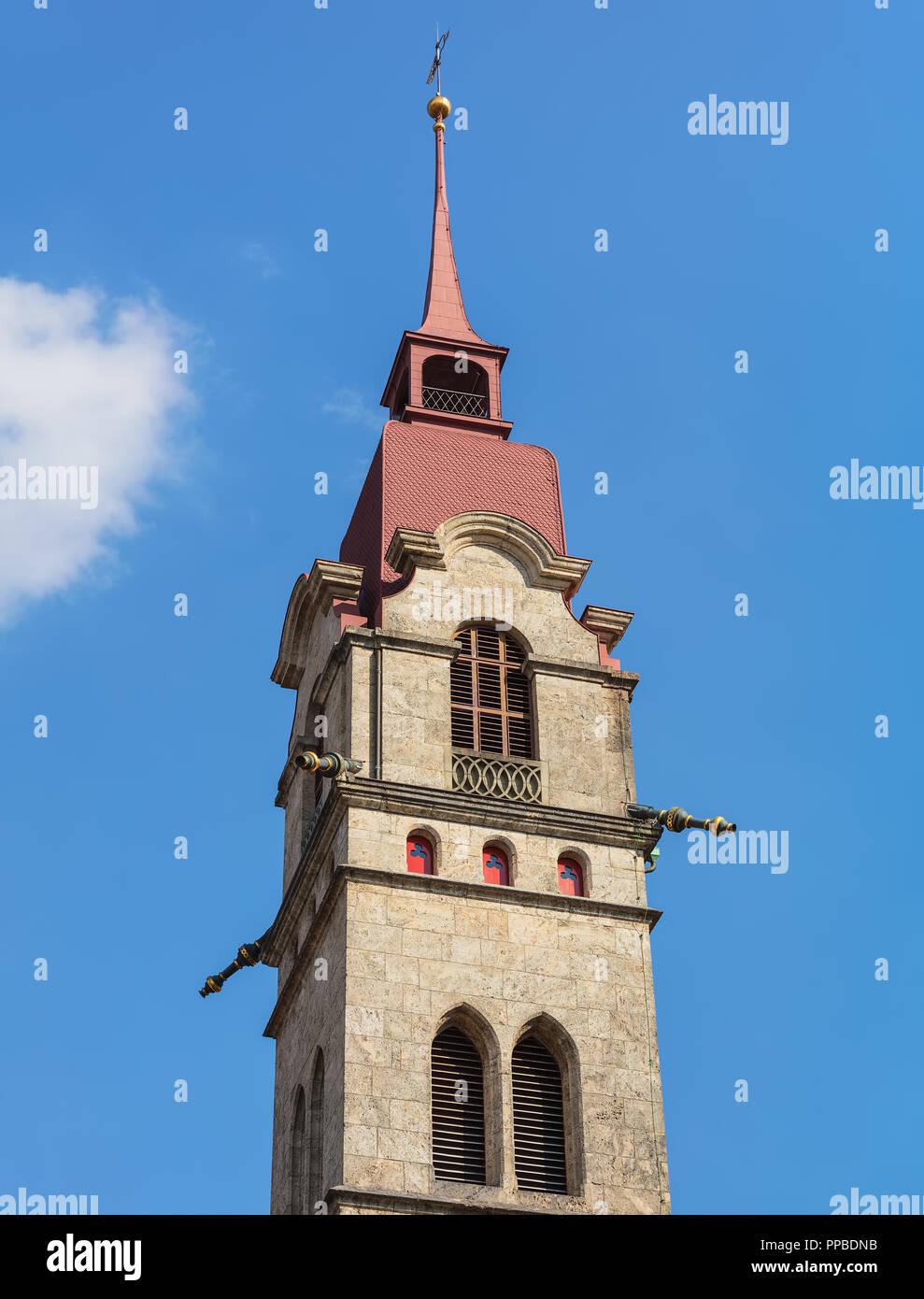 One of two towers of the City Church of Winterthur (German: Stadtkirche Winterthur) in Switzerland against blue sky. Stock Photo