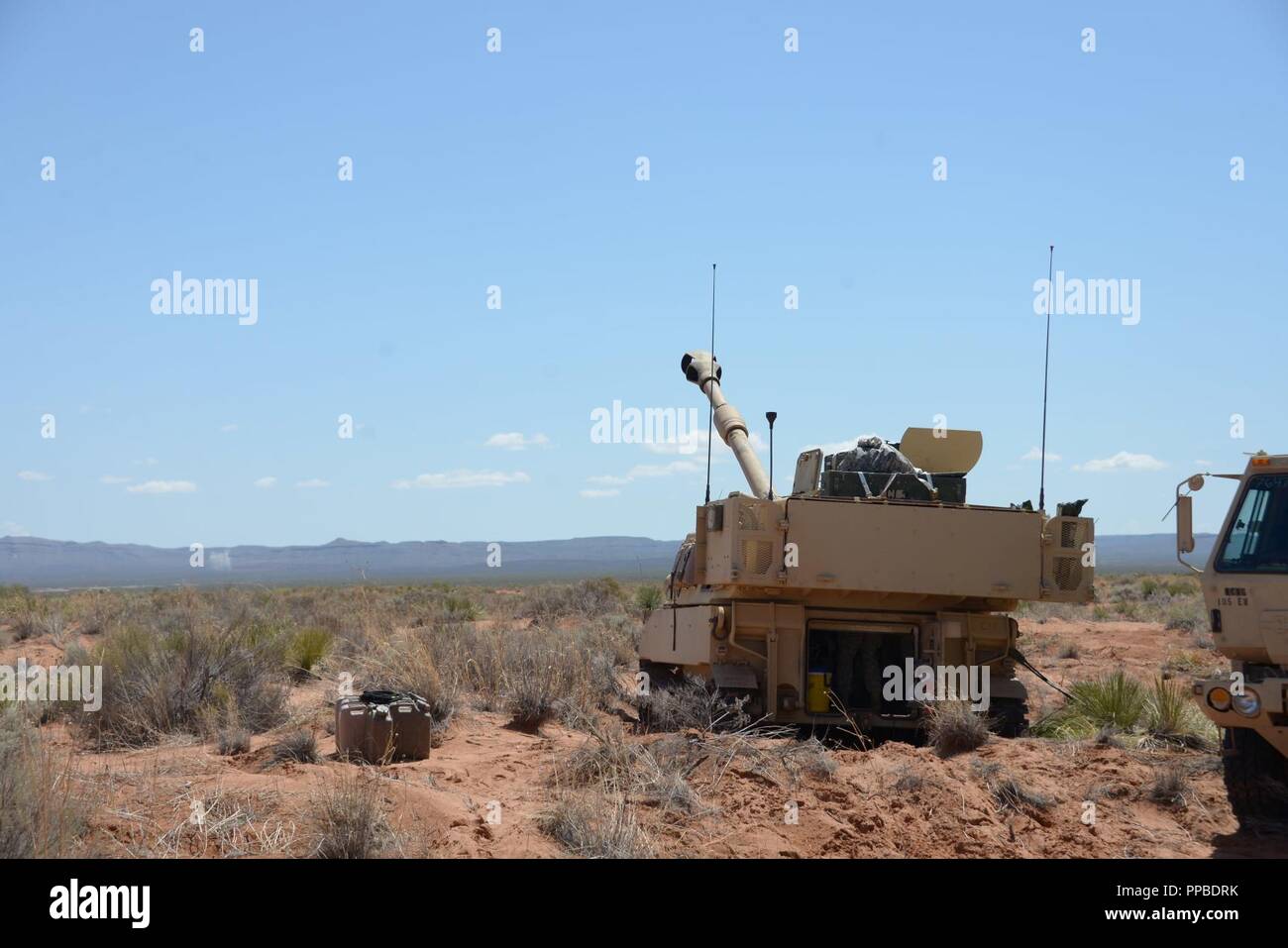 Soldiers with Bravo Battery 1113th Field Artillery Regiment check