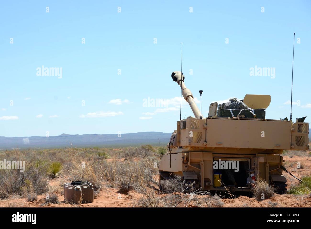 Soldiers with Bravo Battery 1113th Field Artillery Regiment check