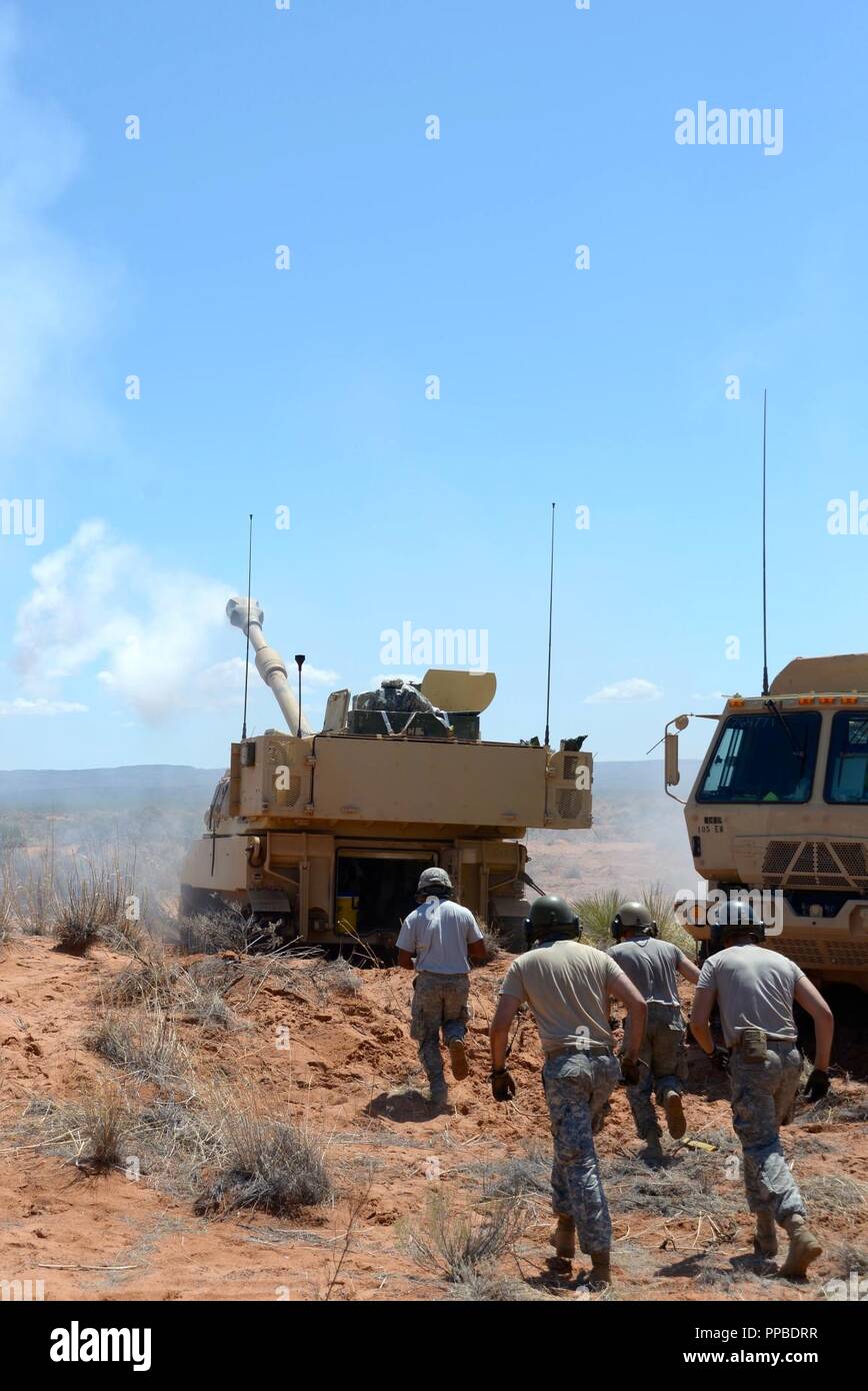 Soldiers with Bravo Battery 1113th Field Artillery Regiment check