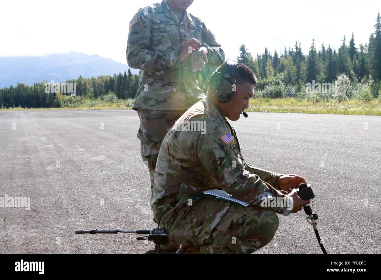 Spc. Alibin, a native of Lahaina, Hawaii assigned to the Unmanned Aerial Systems platoon, D Company, 6th Brigade Engineer Battalion, 4th Infantry Brigade Combat Team (Airborne), 25th Infantry Division prepares to launch the RQ-7 Shadow at Joint Base Elmendorf-Richardson, Alaska. Stock Photo