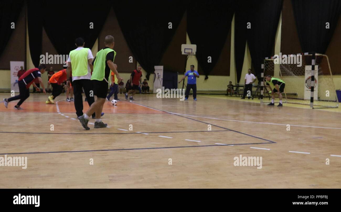 CAMP ARIFJAN, Kuwait Both teams race forward as one of the athletes