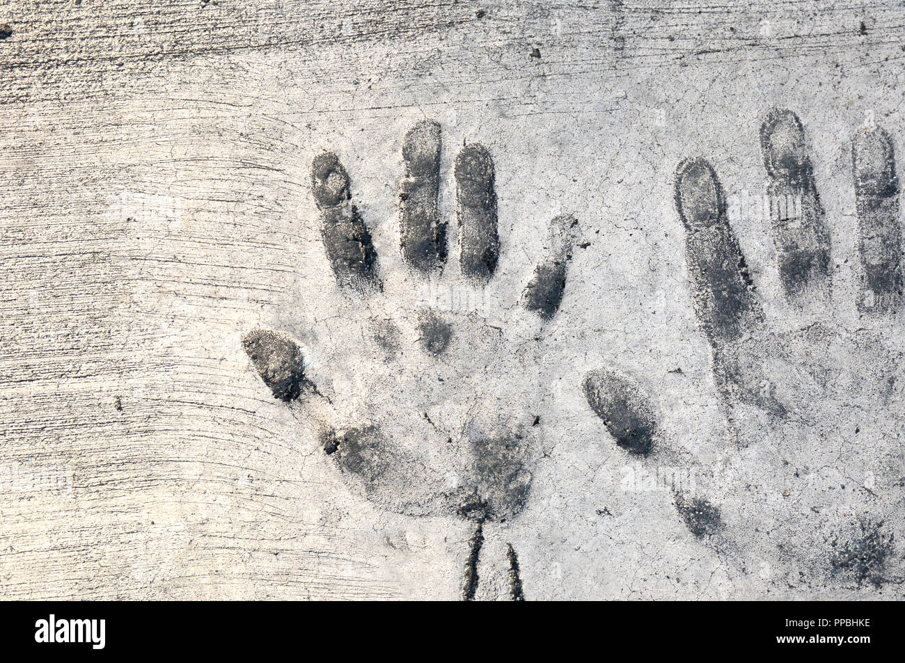 baby handprint in cement